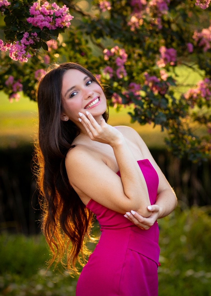 Senior portrait in a magenta dress